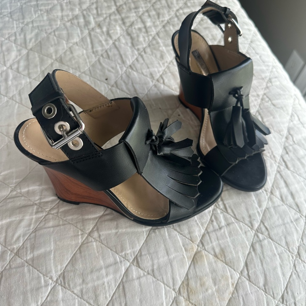BCBGeneration Black Leather Fringe Wedge Sandals